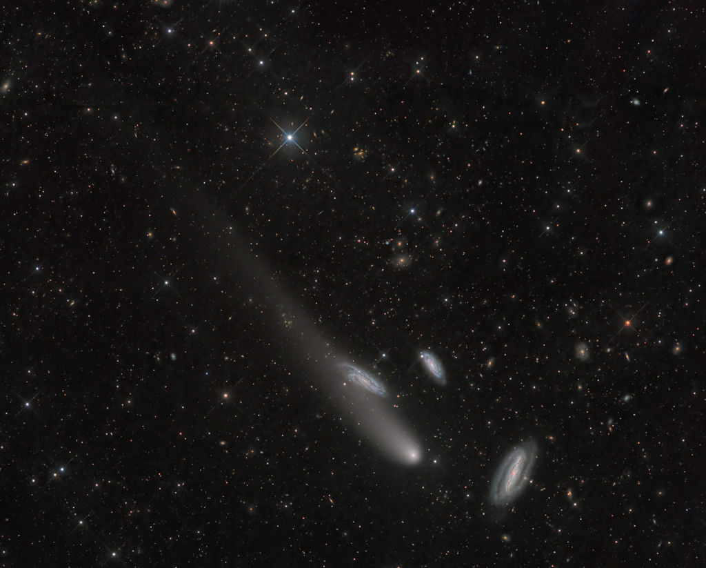Three Galaxies and a Comet