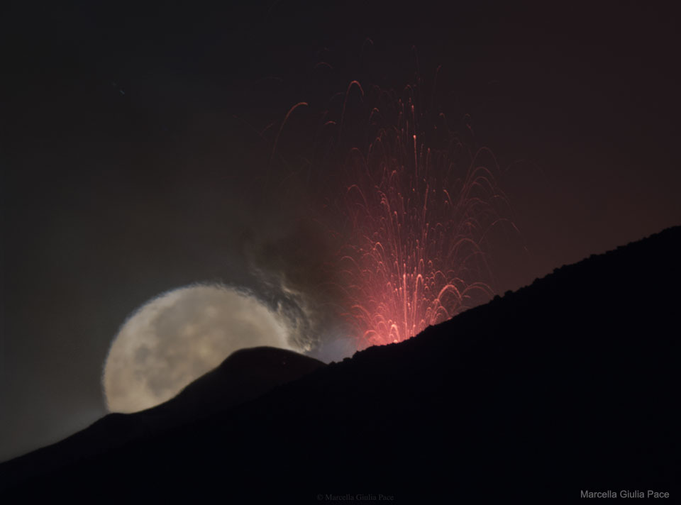 Moon behind Lava Fountain