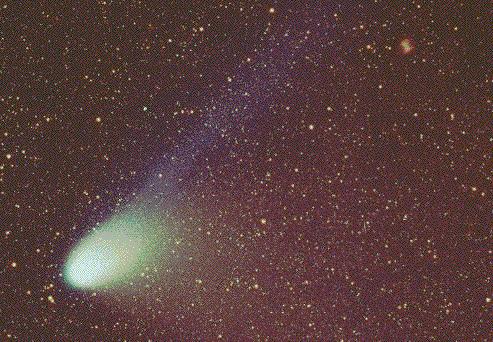 Comet Hale-Bopp and the Dumbbell Nebula
Credit and Copyright: