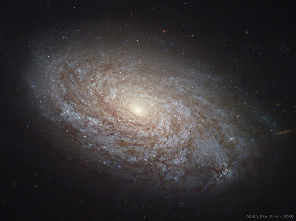 NGC 4414: A Flocculent Spiral Galaxy