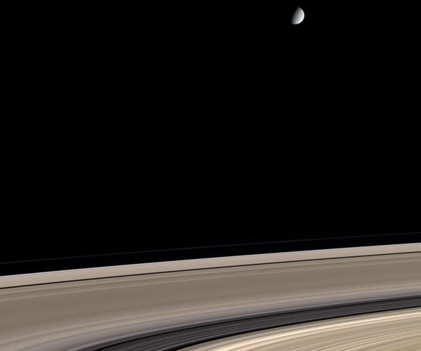 Saturn: Dirty Rings and a Clean Moon
