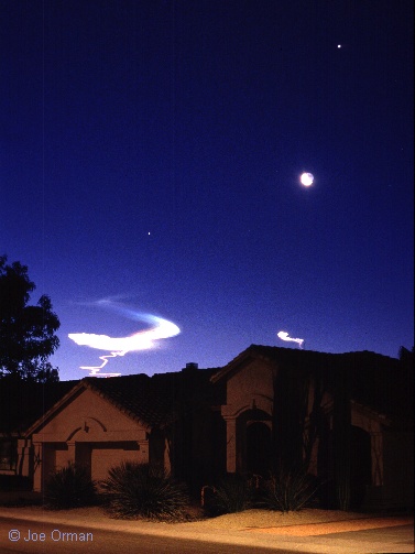 Moon, Planets, and Rocket Trails
