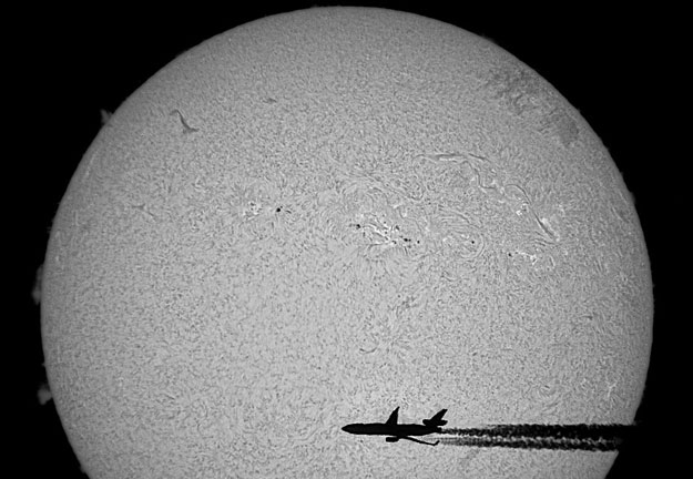 An Airplane in Front of the Sun