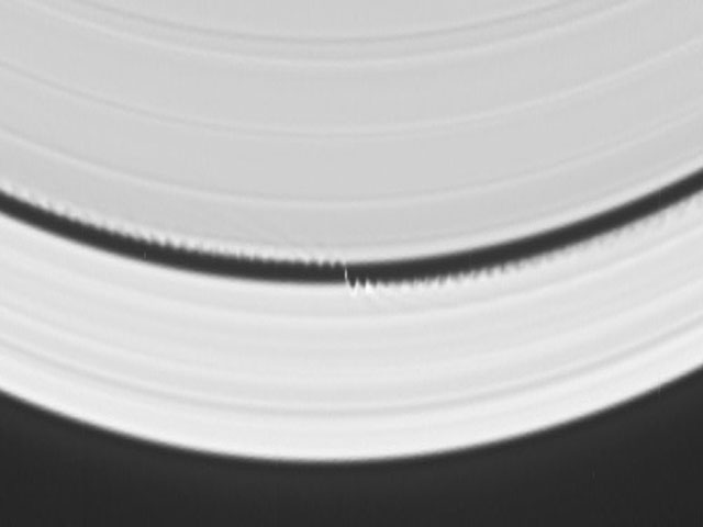 A Wave Maker Moon in Saturn's Rings